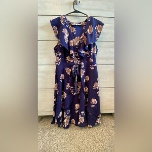 Beautiful Ruffle Dress with Button and Bow Details by Collective Concepts